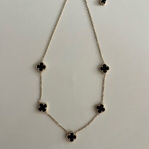 Elegant Gold and Black Necklace